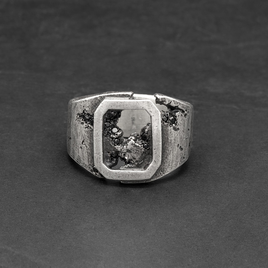 Frame eroded stone ring