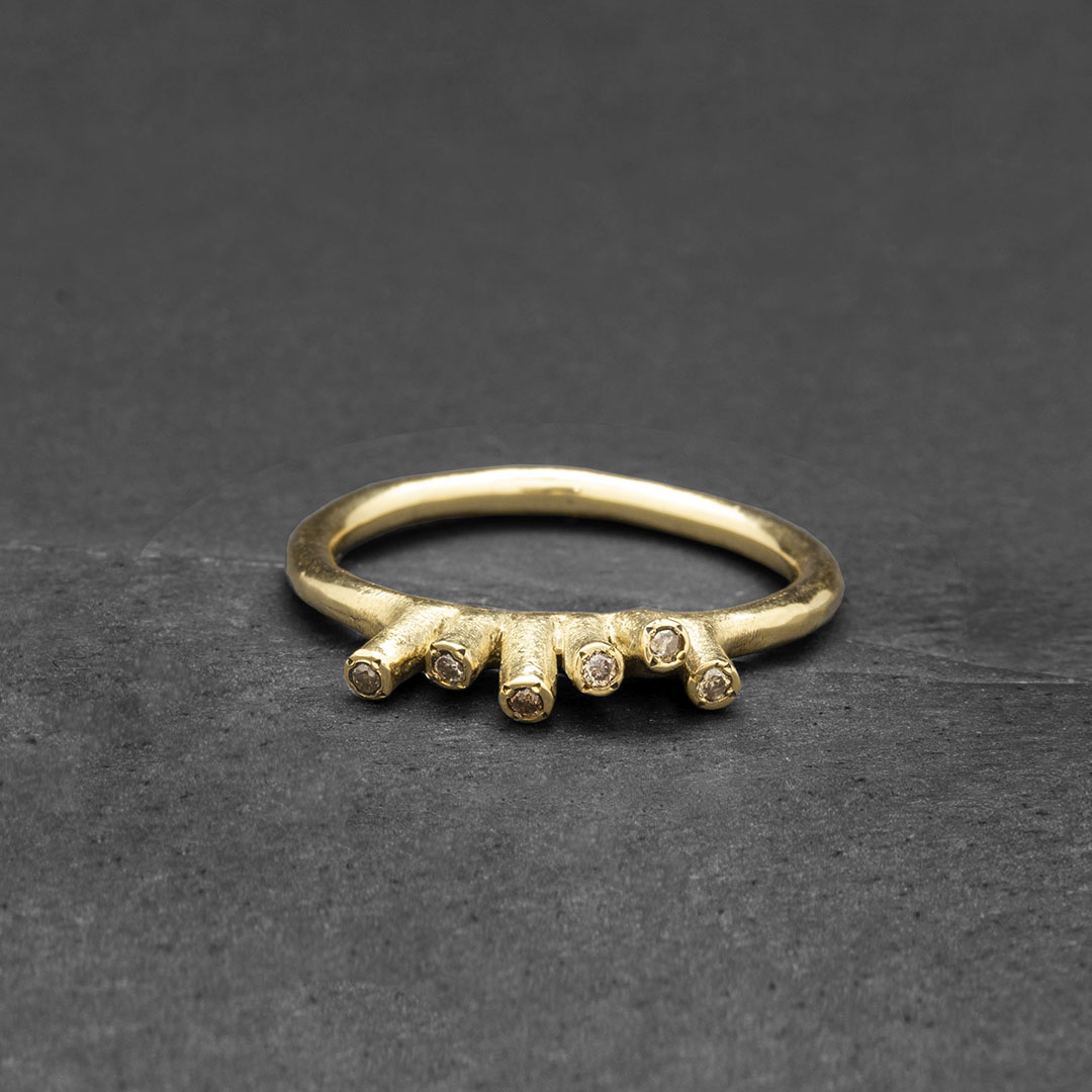 Gold coral C ring