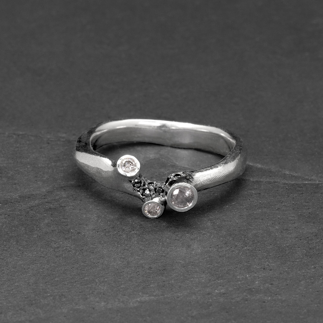 Grey torn ring