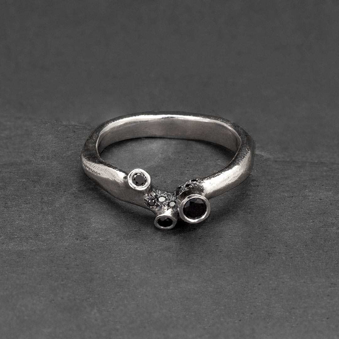 Black torn ring