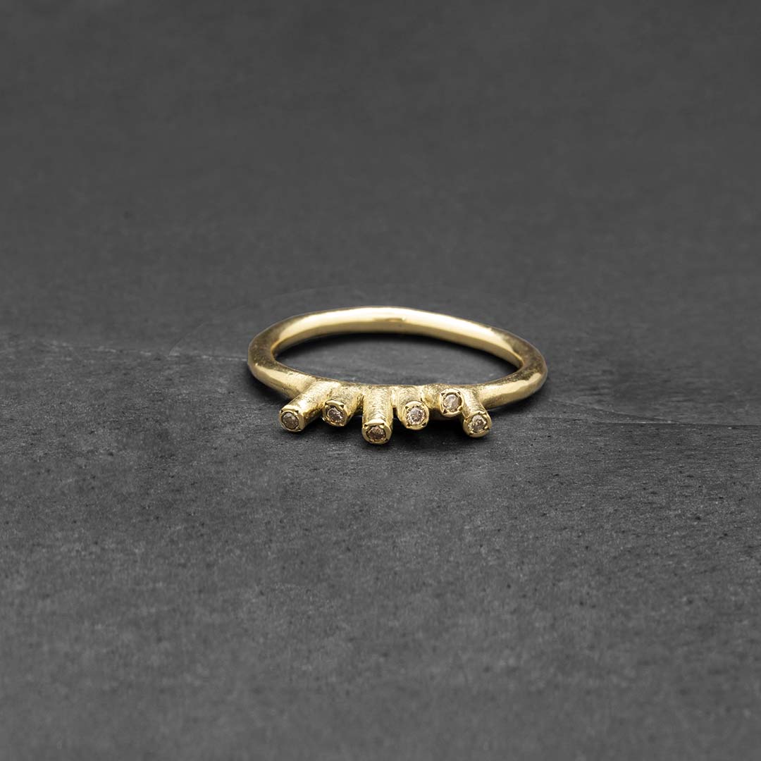 Gold coral C ring