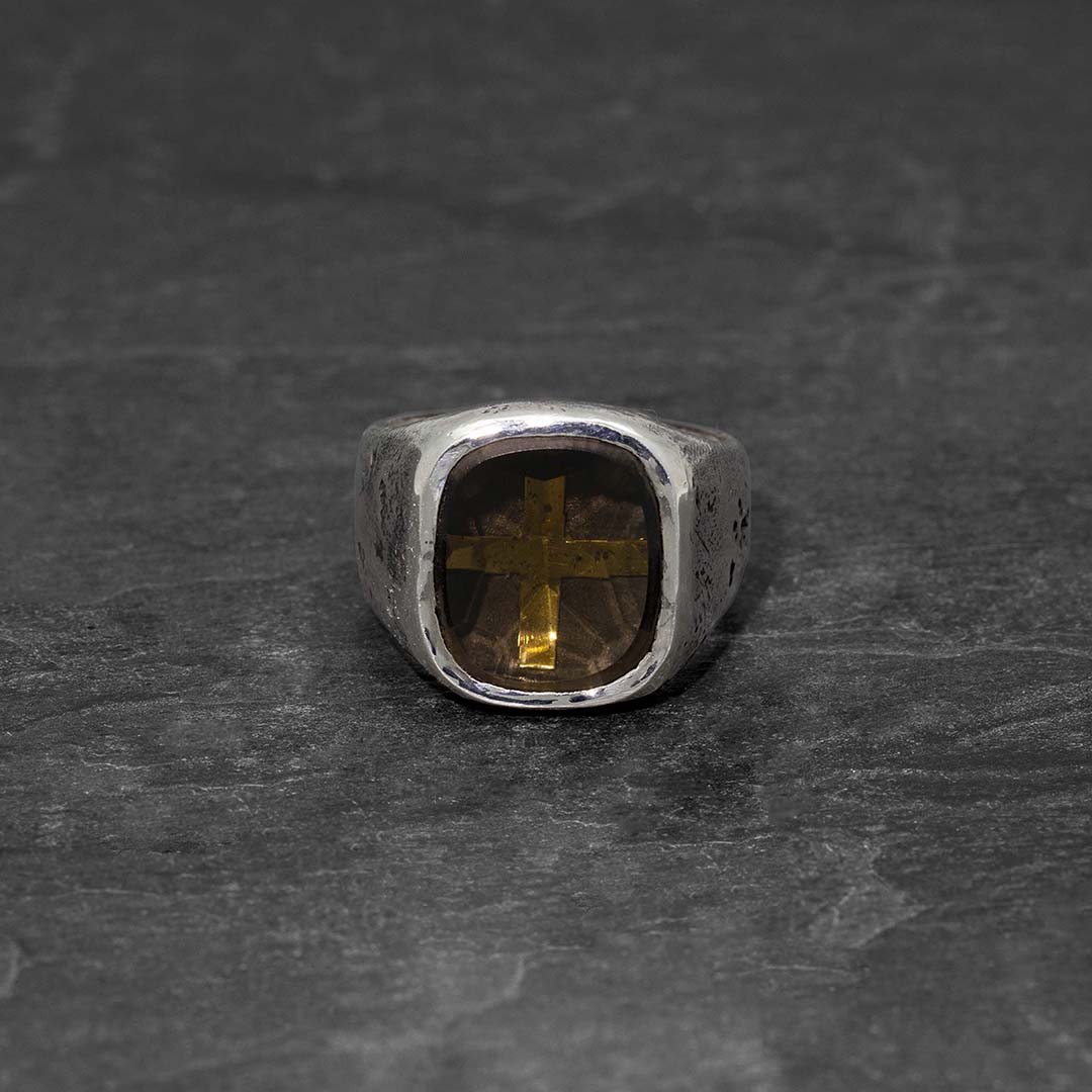 Dark hidden cross stone ring