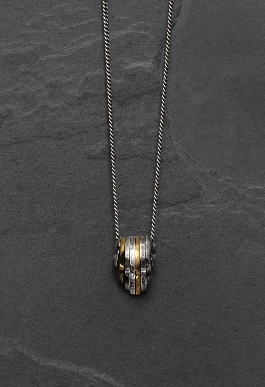 Sliced skull necklace