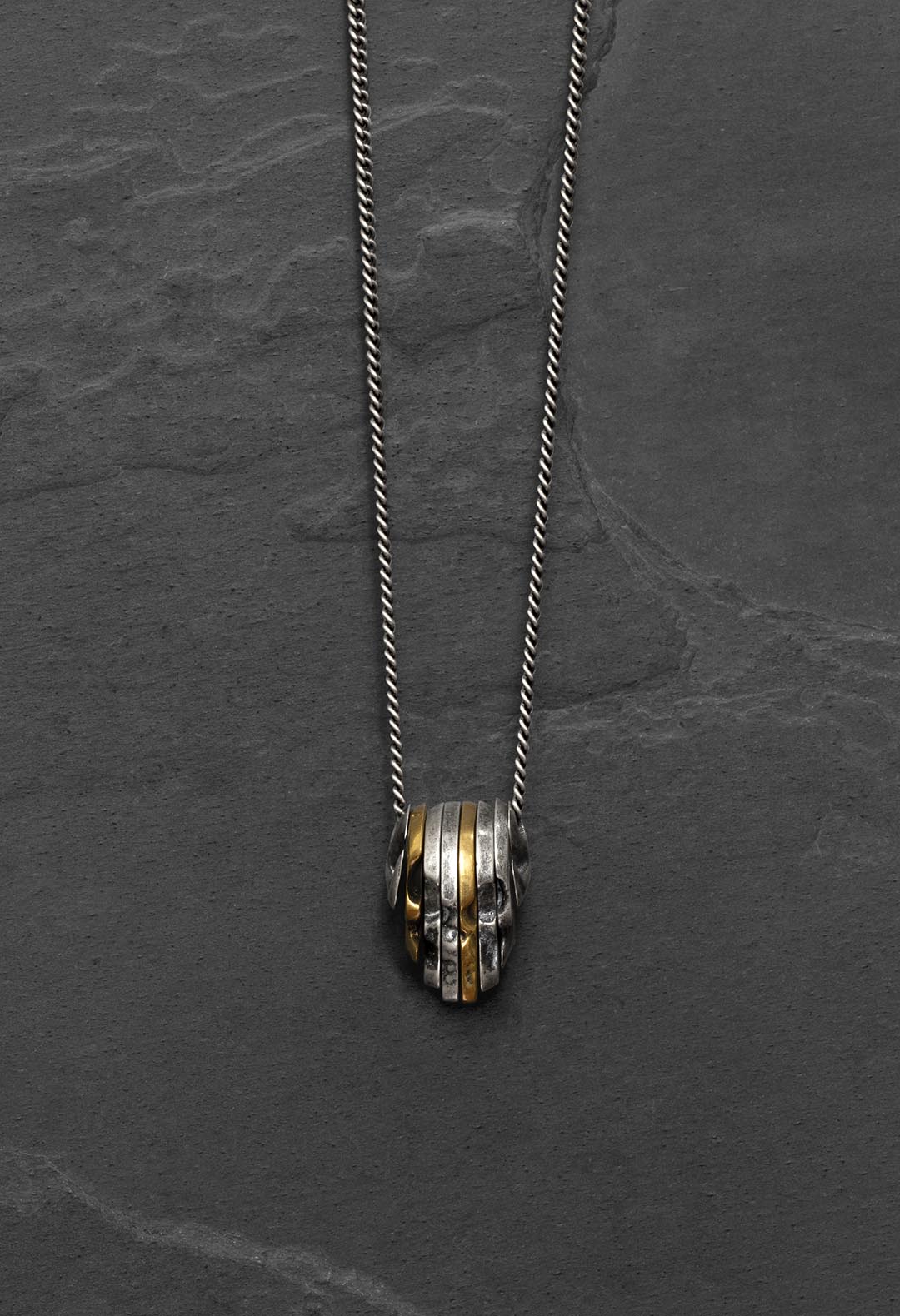 Sliced skull necklace