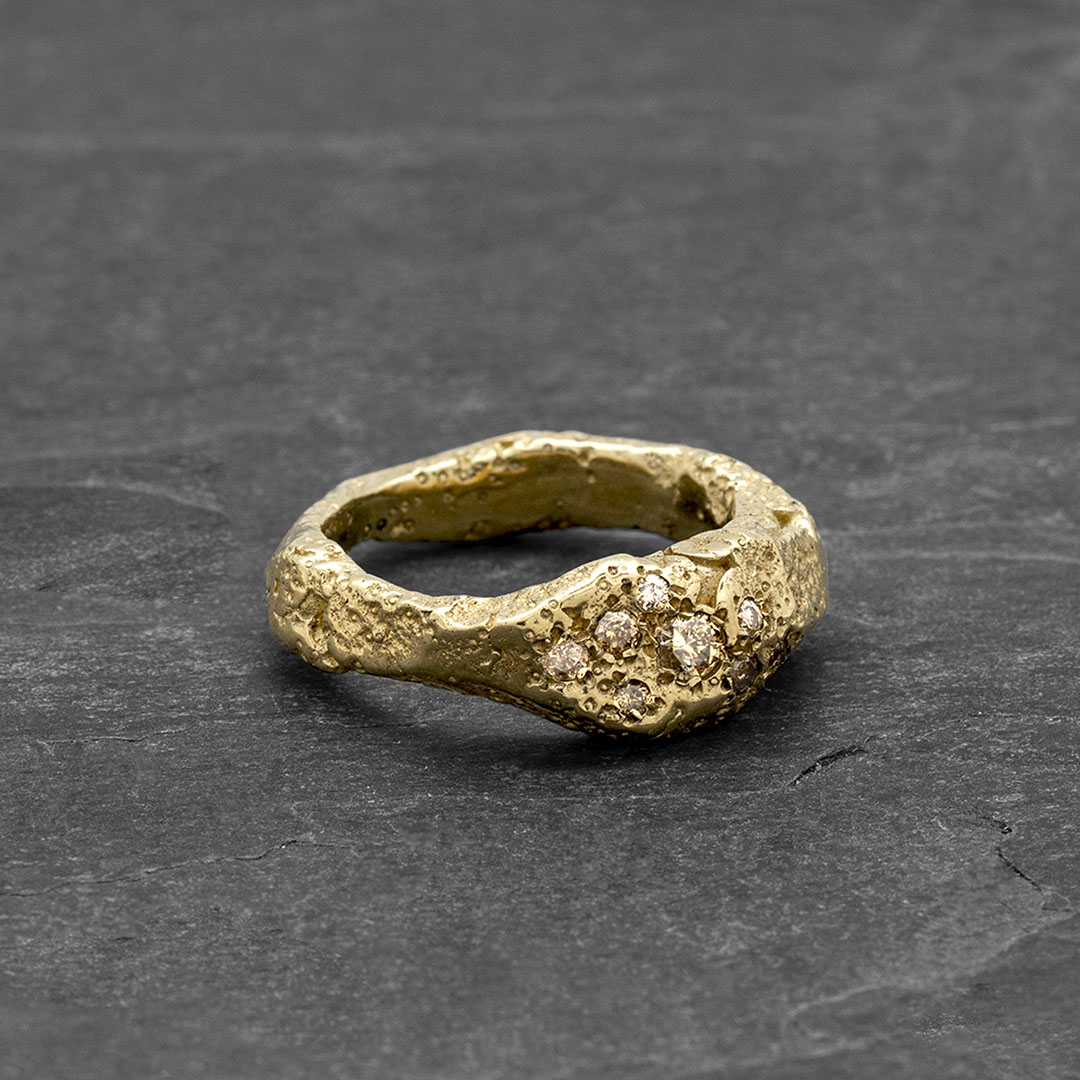 Gold stones rock ring